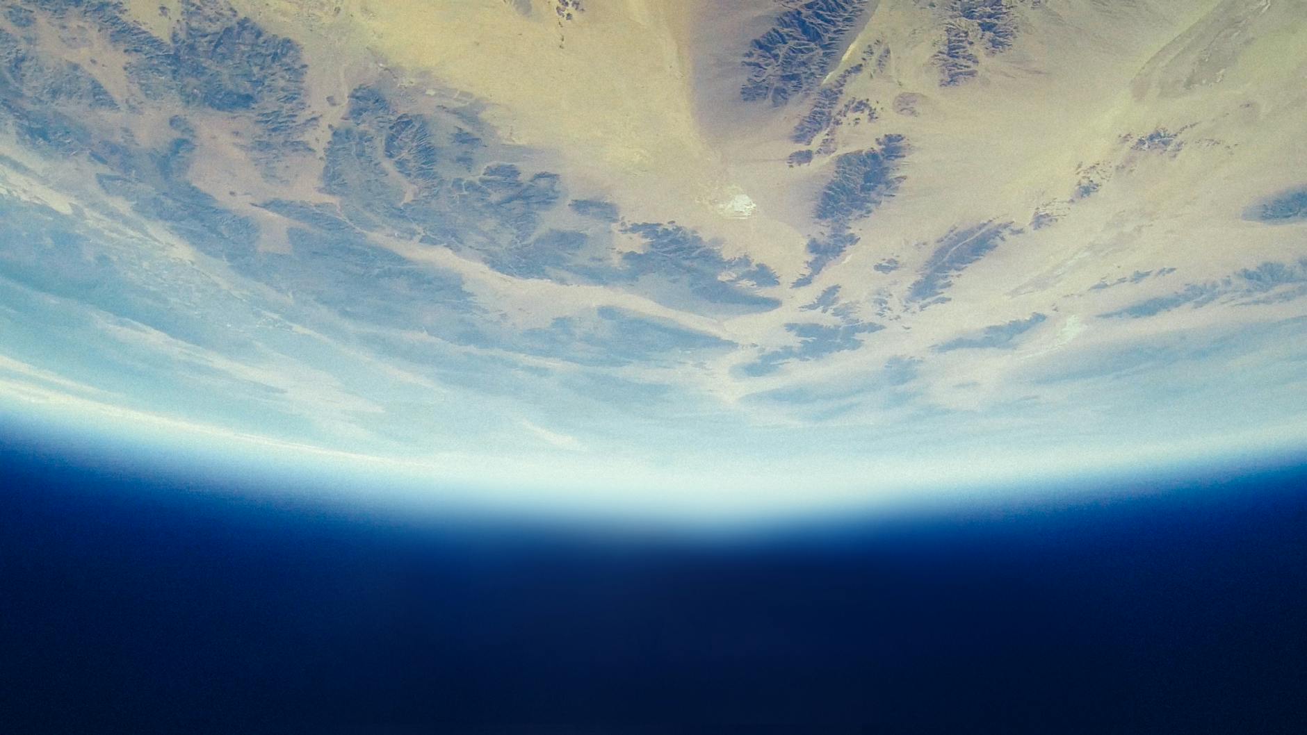 Earth from space showing continents and oceans — a rare combination of conditions that may make complex life unusual in the universe