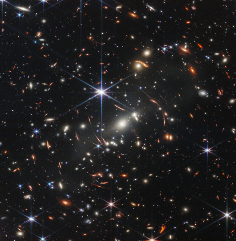 JWST First Deep Field image showing thousands of distant galaxies including the galaxy cluster SMACS 0723, the deepest infrared image of the universe ever taken