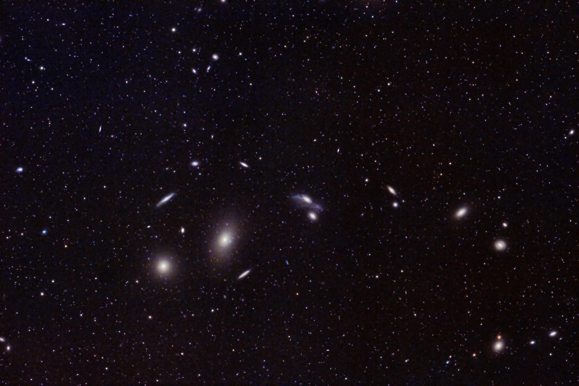 Distant galaxies already beyond the cosmic event horizon, their ancient light still arriving