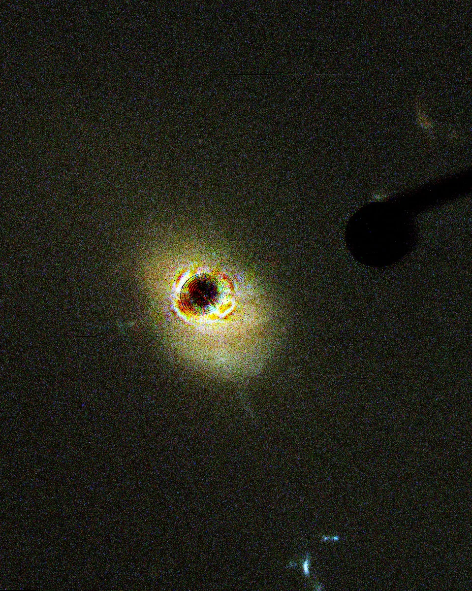 What is a quasar? This image shows what one looks like, but what is it?