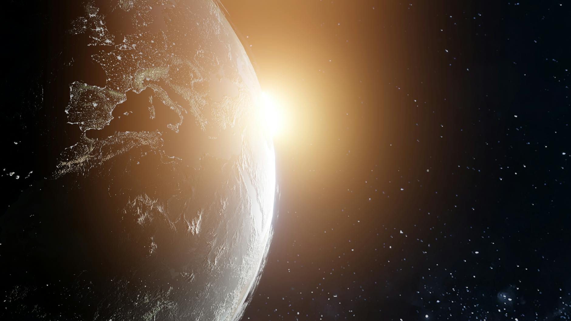 Earth at sunrise seen from space, showing the day-night terminator