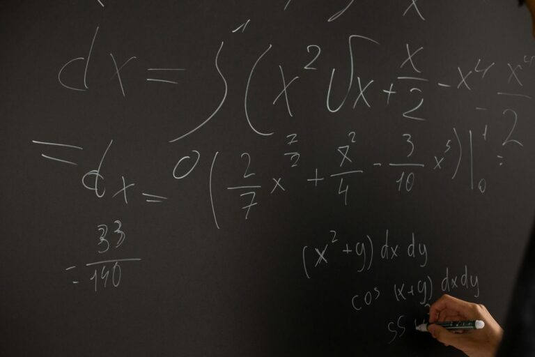 mathematics describes nature — Complex mathematical equations on a blackboard, representing the deep connection between mathematics and physical reality.