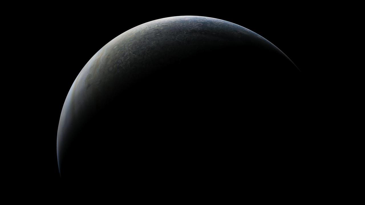 Crescent view of Jupiter captured by NASA's Juno spacecraft