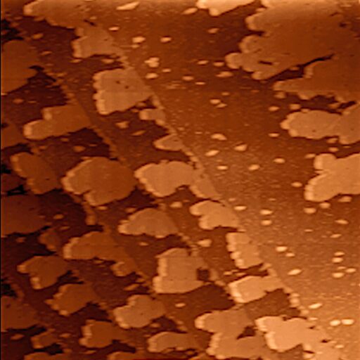 Scanning tunneling microscope image of atom-thick silver islands on a surface